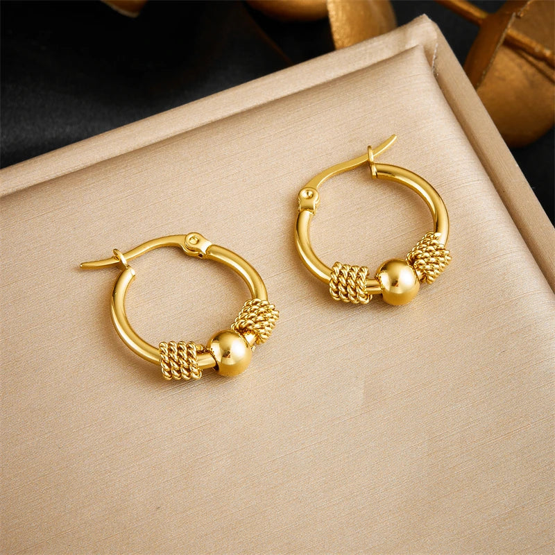 Halo Weave Earrings – inspired by the circular, woven design.