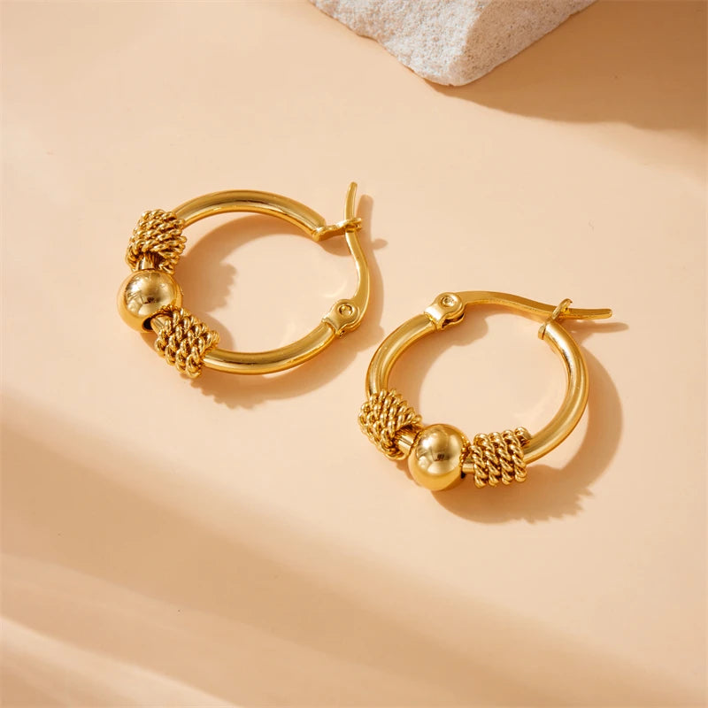 Halo Weave Earrings – inspired by the circular, woven design.